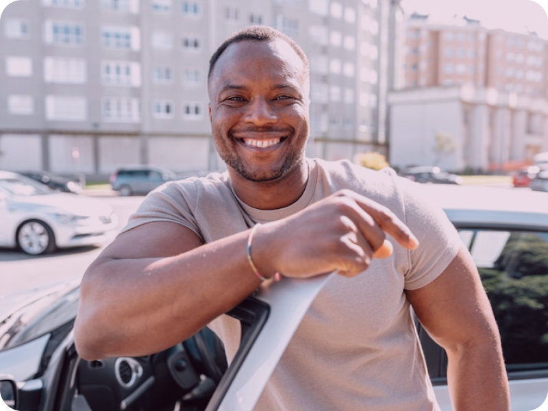 Professional chauffeur smiling